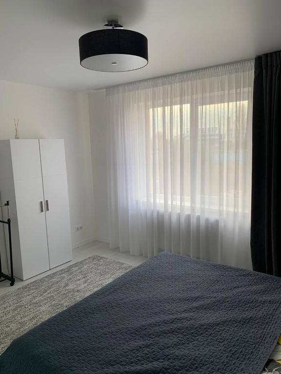 Postel nebo postele na pokoji v ubytování NEW modern apartment