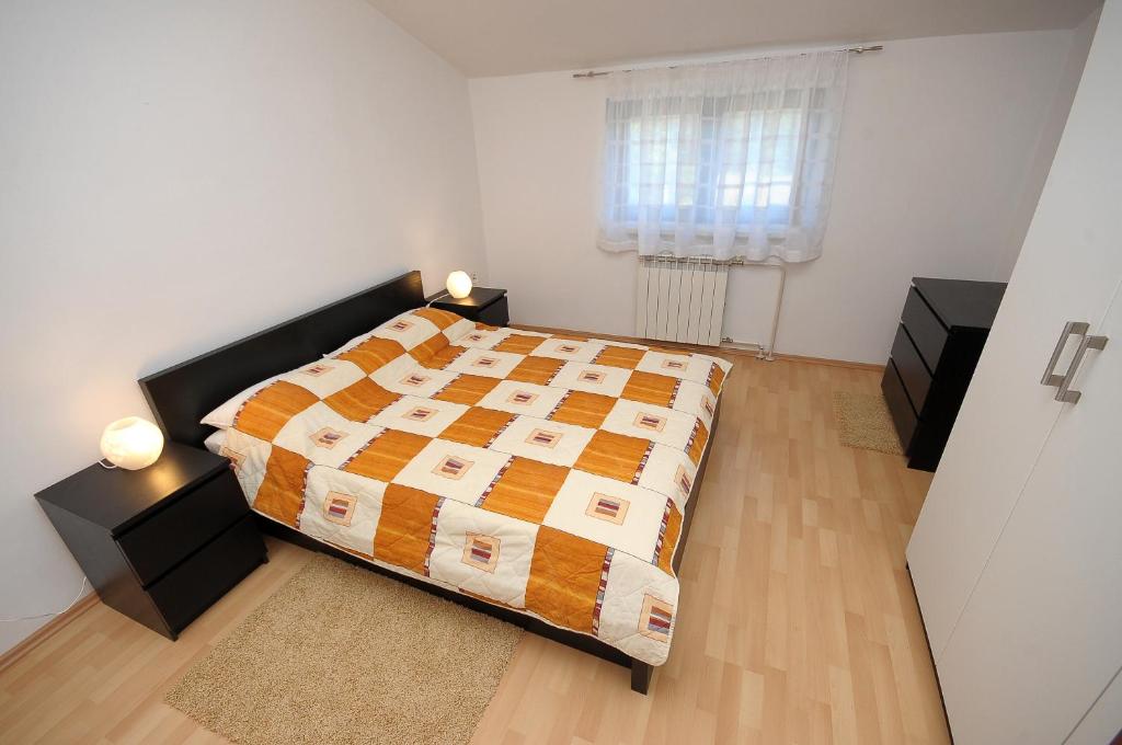 Łóżko lub łóżka w pokoju w obiekcie Apartament VV