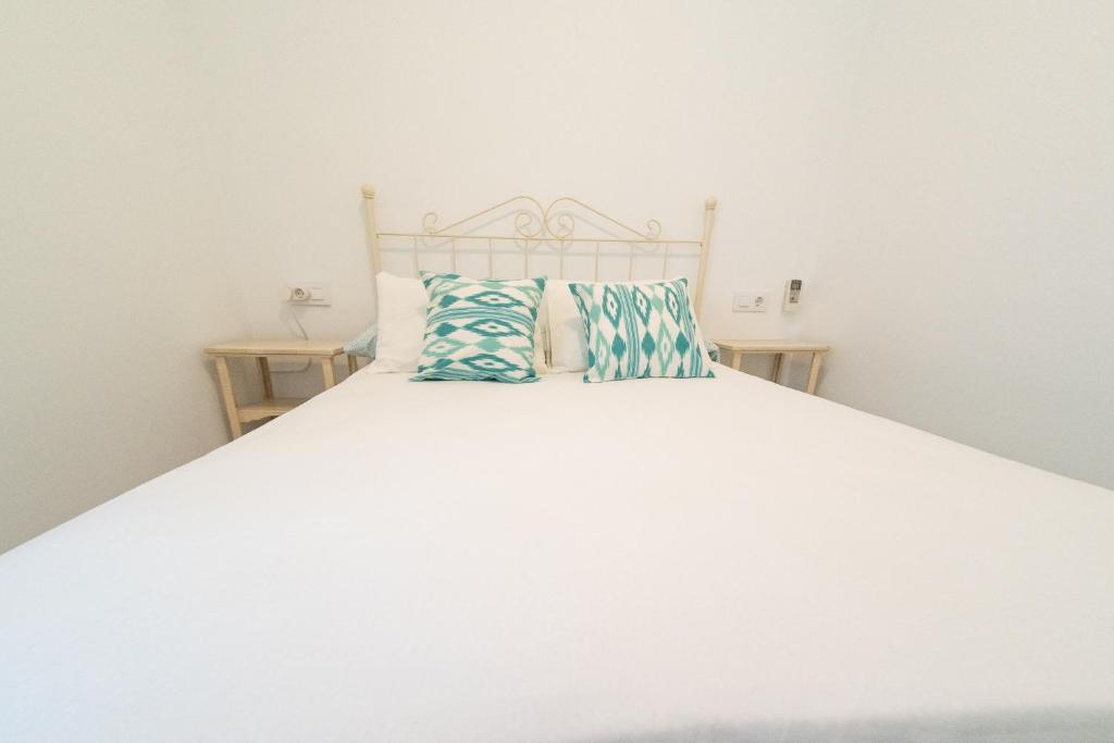Posteľ alebo postele v izbe v ubytovaní Apartamento Centro Calle Plata