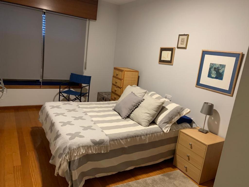 Posteľ alebo postele v izbe v ubytovaní Apartamento Náutico
