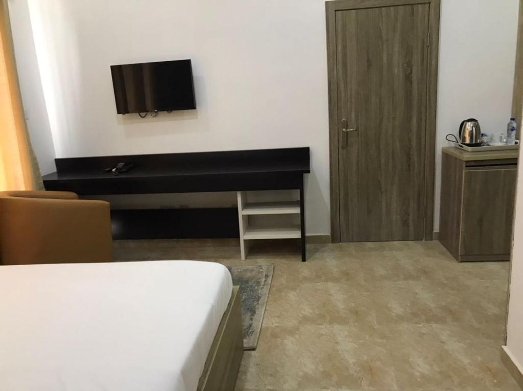 Postel nebo postele na pokoji v ubytování Hotel Capitol