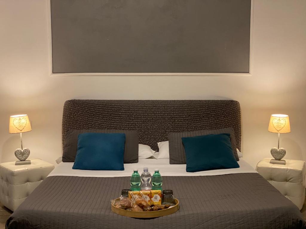 Łóżko lub łóżka w pokoju w obiekcie AgriSesto B&B