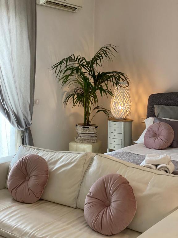 Łóżko lub łóżka w pokoju w obiekcie AgriSesto B&B