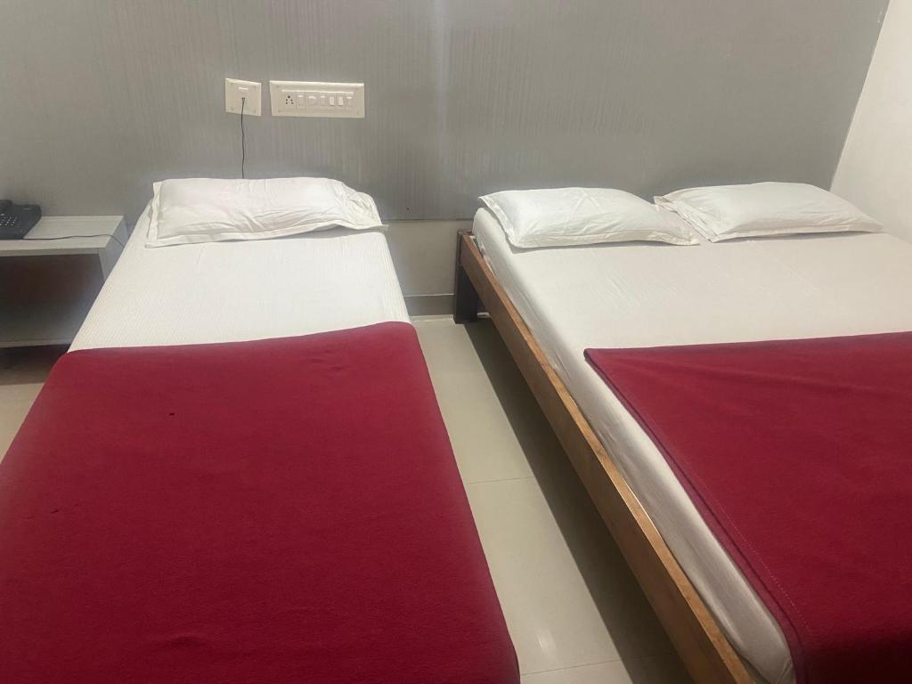 Postel nebo postele na pokoji v ubytování Star Residency