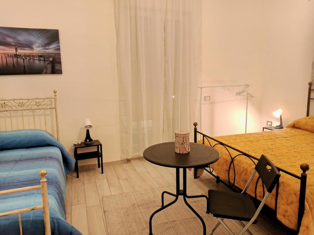 Posteľ alebo postele v izbe v ubytovaní Le Stanze di Ginevra 2-Santa Maria a Vico-
