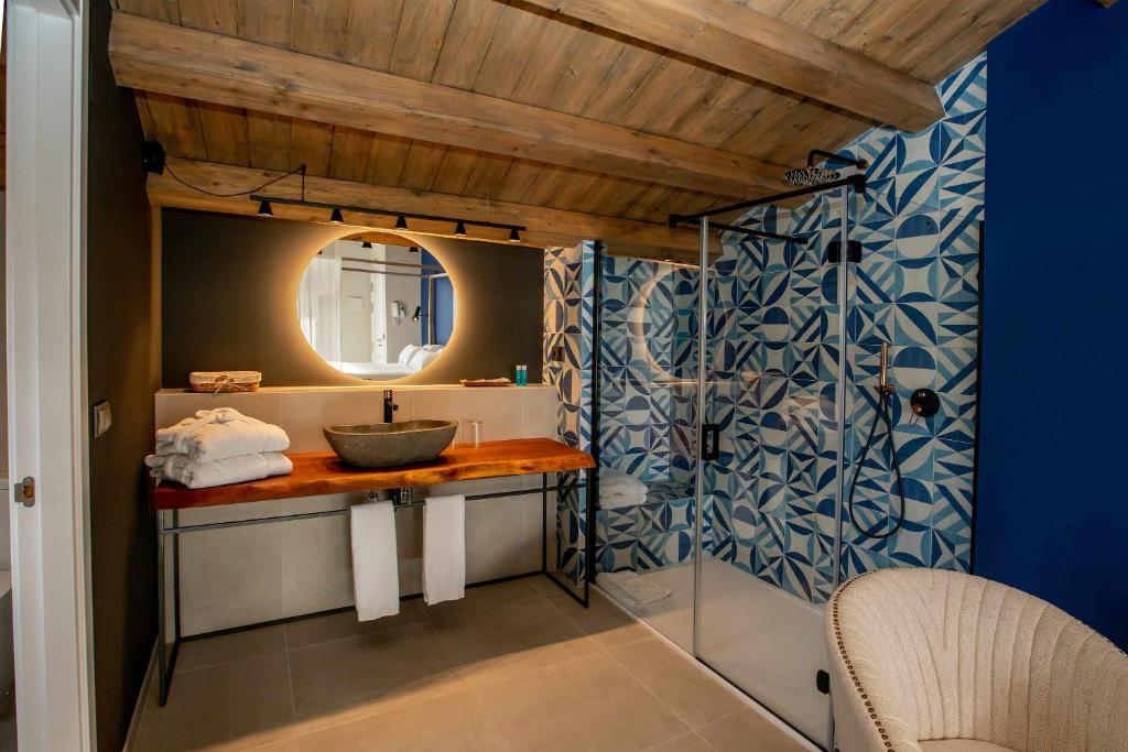 Postel nebo postele na pokoji v ubytování Mochoruralhome ulldemo suite
