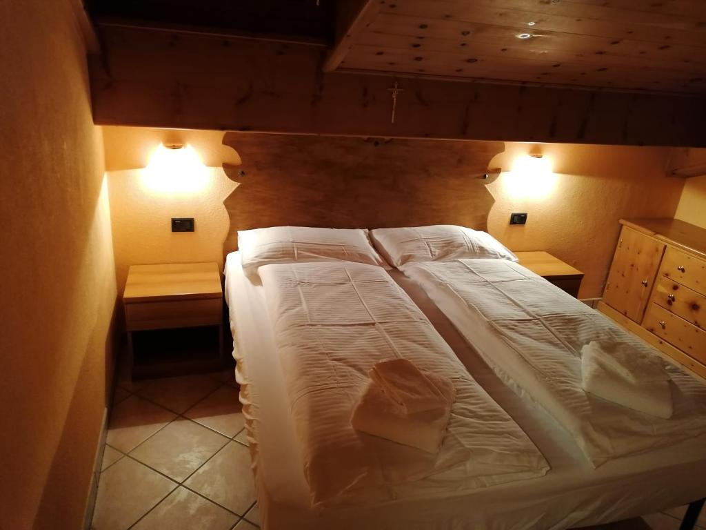 Łóżko lub łóżka w pokoju w obiekcie Wood Apartments