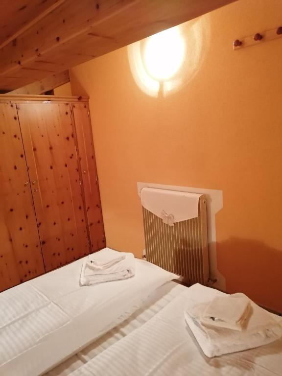 Łóżko lub łóżka w pokoju w obiekcie Wood Apartments