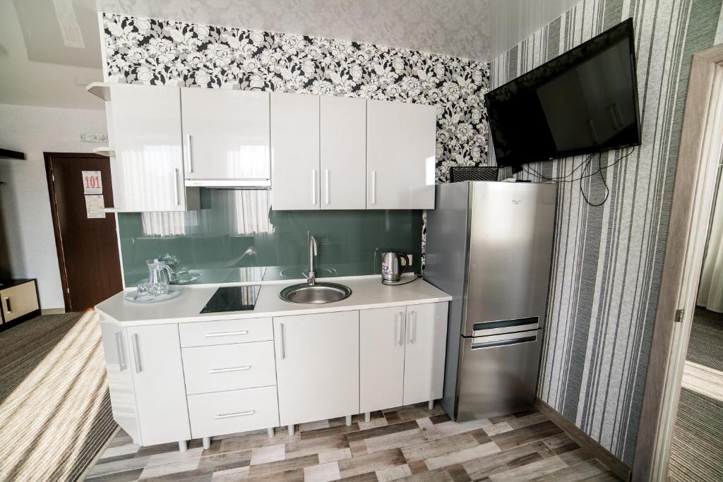 Kuchyň nebo kuchyňský kout v ubytování Hotel Solomiya