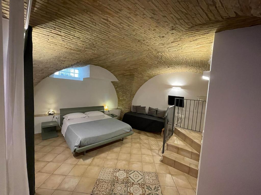 A bed or beds in a room at B&B Sacca
