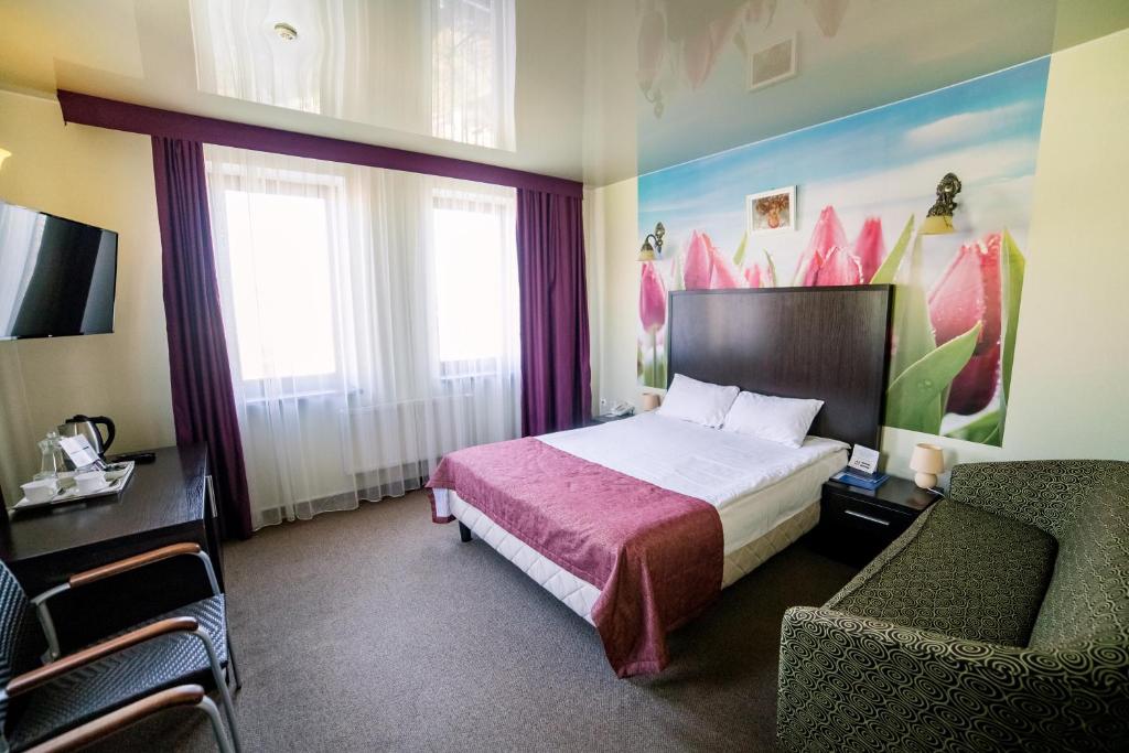 Postel nebo postele na pokoji v ubytování Hotel Solomiya