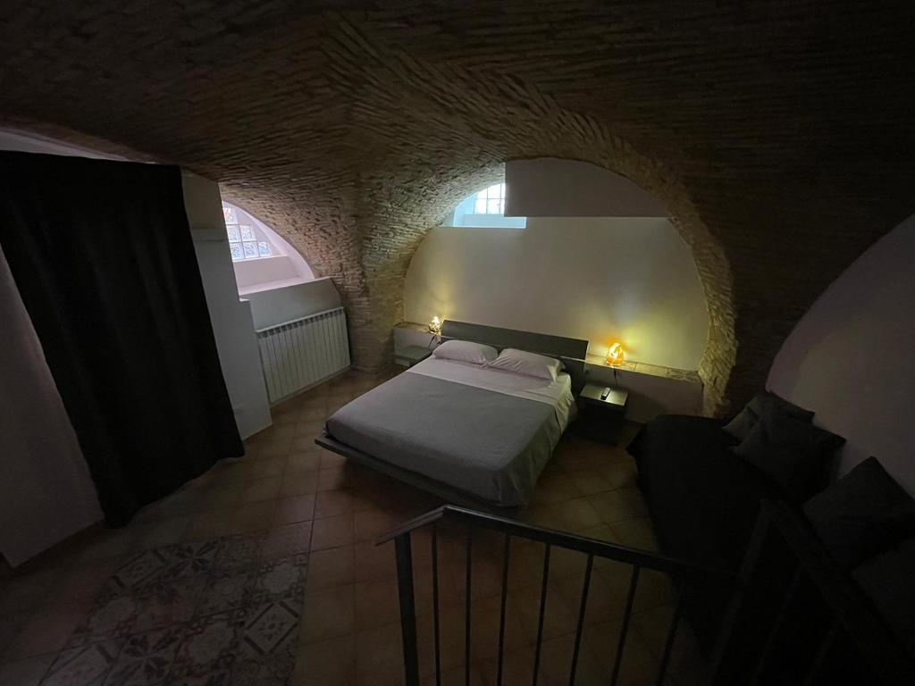 A bed or beds in a room at B&B Sacca