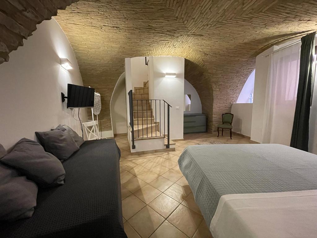 A bed or beds in a room at B&B Sacca