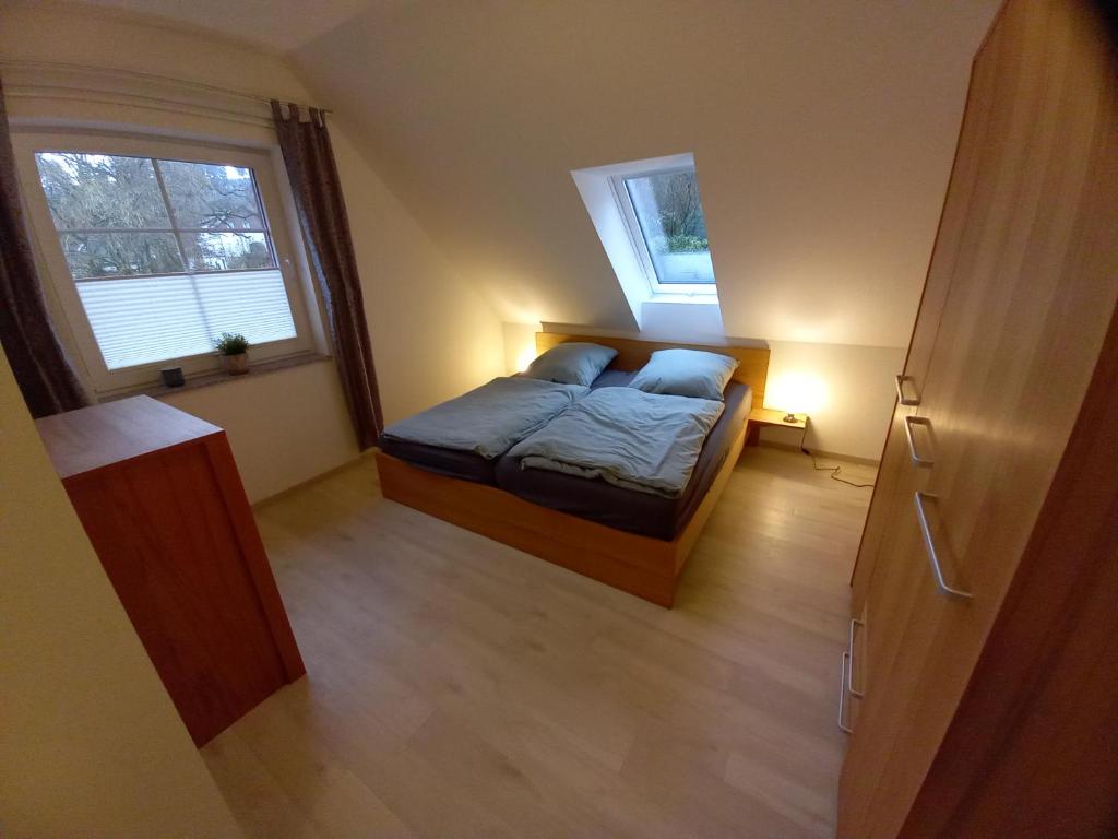 Postel nebo postele na pokoji v ubytování Alte Mühle