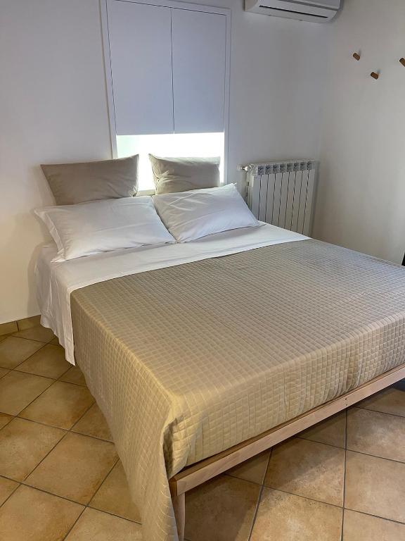 A bed or beds in a room at B&B Sacca