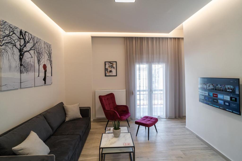 TV a/nebo společenská místnost v ubytování Lux Palace Trikala