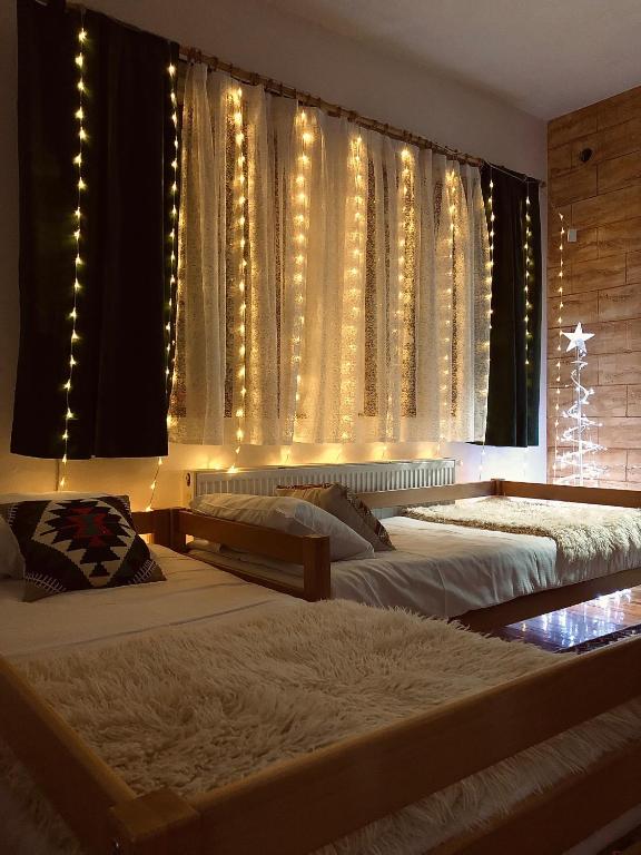 Postel nebo postele na pokoji v ubytování Alpin Apartments Vlašić