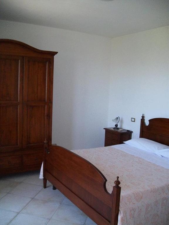 Postel nebo postele na pokoji v ubytování La Collina Del Sagrantino