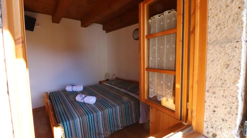 Postel nebo postele na pokoji v ubytování Dependance GRIMANI