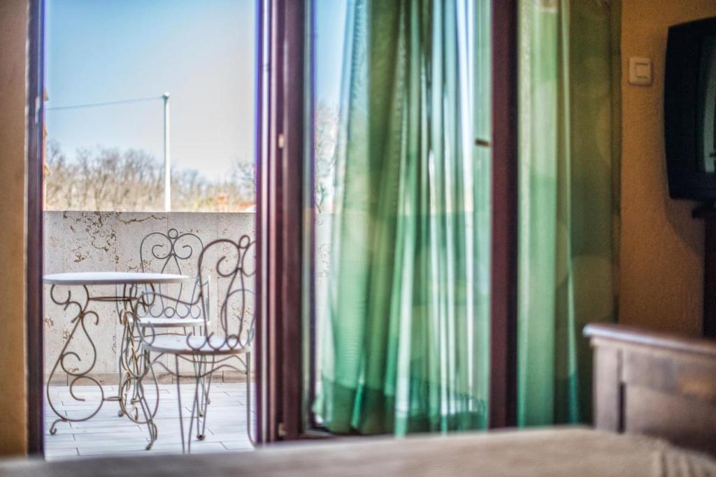 TV a/nebo společenská místnost v ubytování Holiday house Eleonora