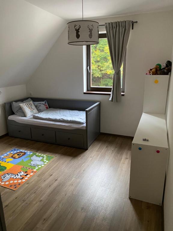 Postel nebo postele na pokoji v ubytování Chata na Zlatém Hamru