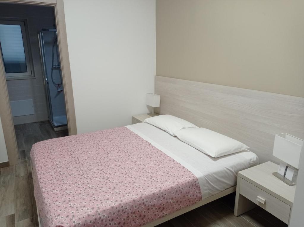 A bed or beds in a room at Dimora Pianelle