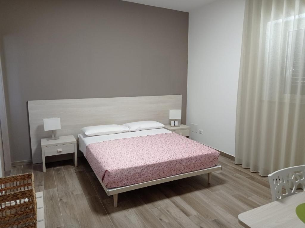 A bed or beds in a room at Dimora Pianelle