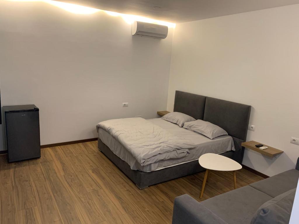 Postel nebo postele na pokoji v ubytování Vila Topciu