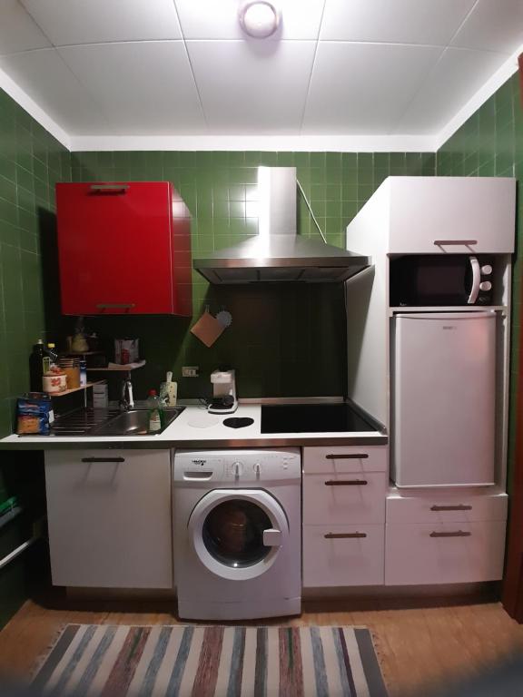 Kuchyň nebo kuchyňský kout v ubytování CASA DI SOLE Appartamento a Crema