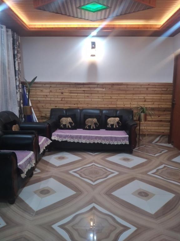 Posezení v ubytování Tridevi Home Stay