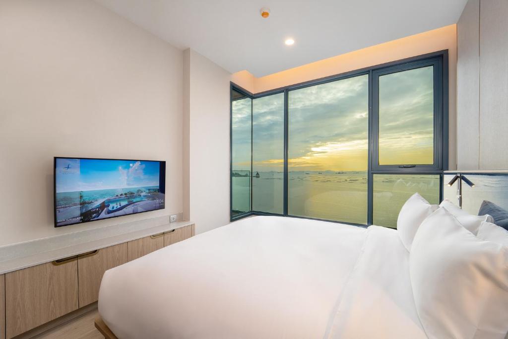 TV a/nebo společenská místnost v ubytování S Sriracha Hotel & Residence