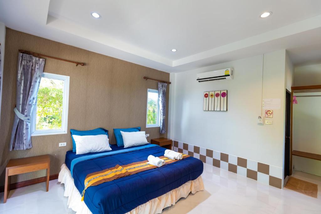 Ein Bett oder Betten in einem Zimmer der Unterkunft Nature Line Resort