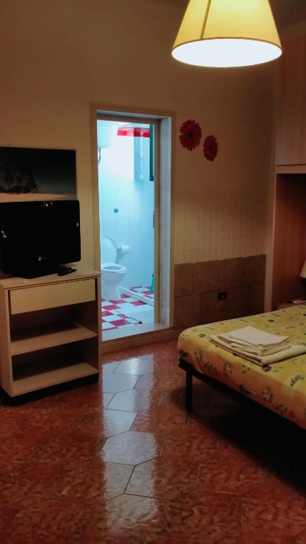 Postel nebo postele na pokoji v ubytování Villa Itaca