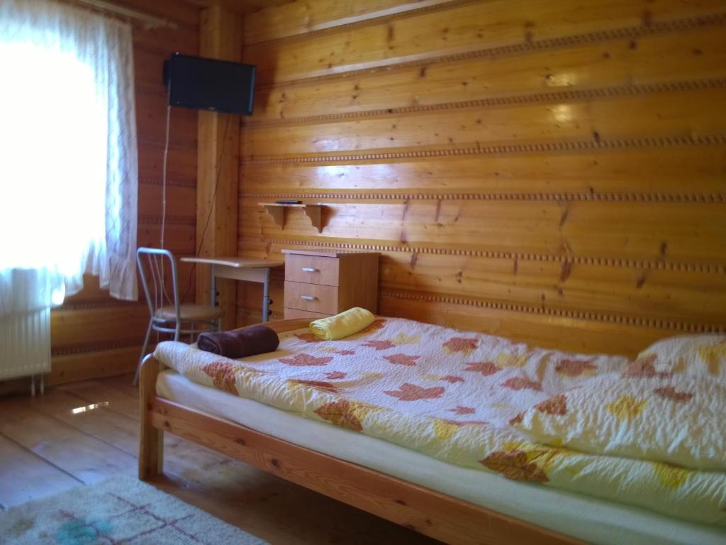Posteľ alebo postele v izbe v ubytovaní Pod Zielonym Bykiem