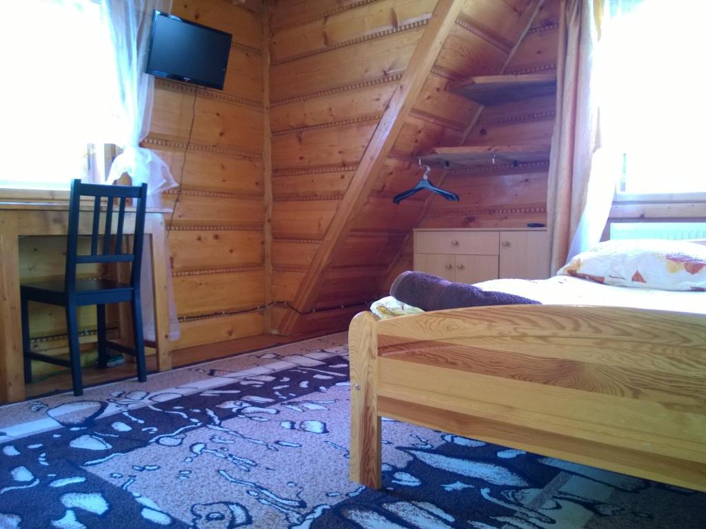 Posteľ alebo postele v izbe v ubytovaní Pod Zielonym Bykiem