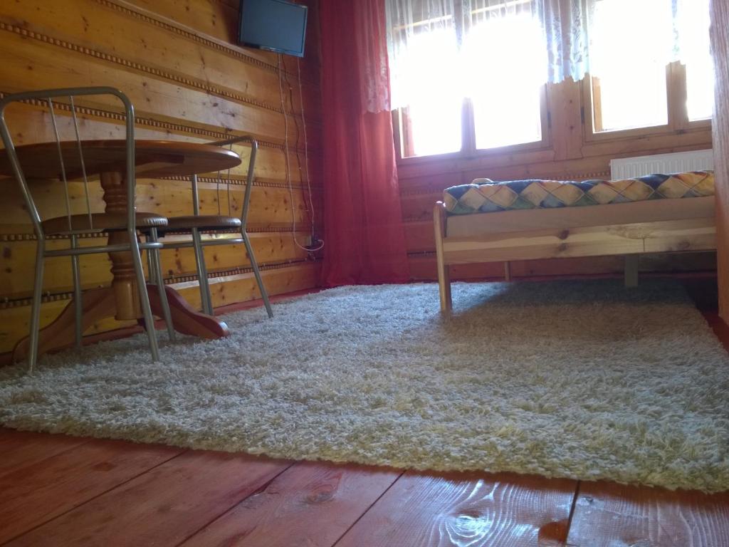 Posteľ alebo postele v izbe v ubytovaní Pod Zielonym Bykiem