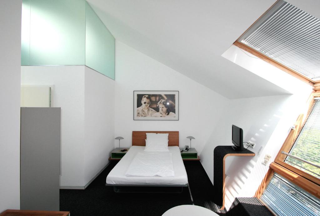 Postel nebo postele na pokoji v ubytování Chelsea Hotel