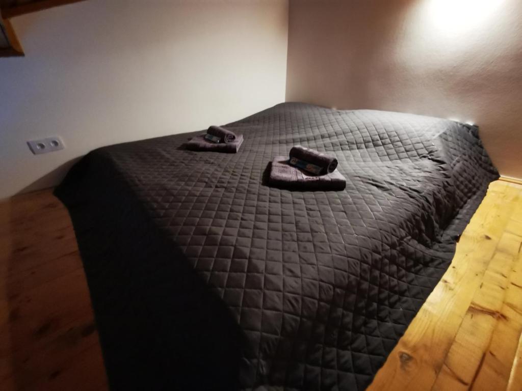 Posteľ alebo postele v izbe v ubytovaní Apartamenty Artur