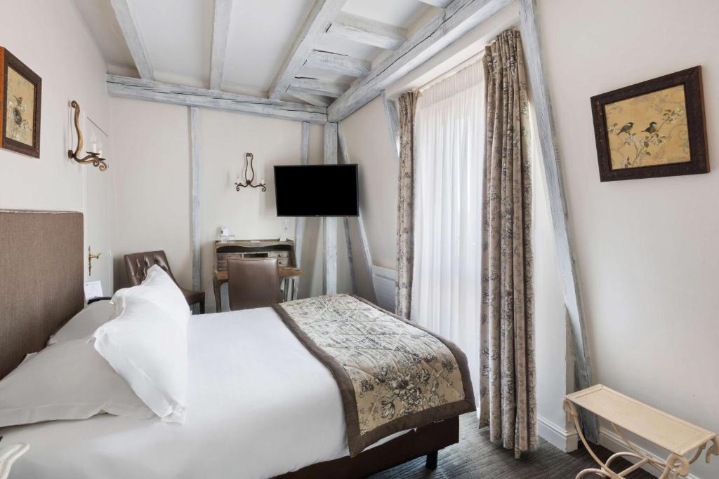 Postel nebo postele na pokoji v ubytování Best Western Plus Hotel Villa D'est