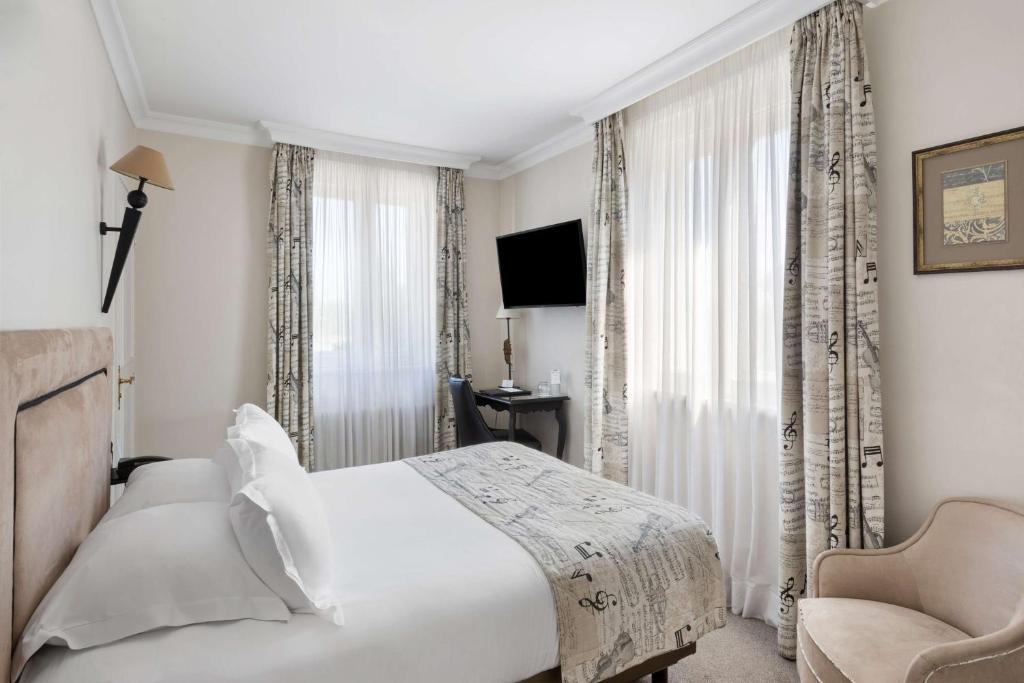 Postel nebo postele na pokoji v ubytování Best Western Plus Hotel Villa D'est