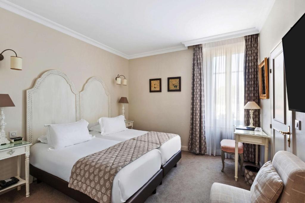 Postel nebo postele na pokoji v ubytování Best Western Plus Hotel Villa D'est