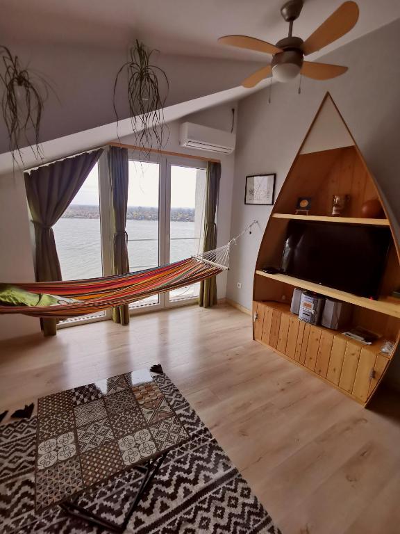 Postel nebo postele na pokoji v ubytování Gardos riverview