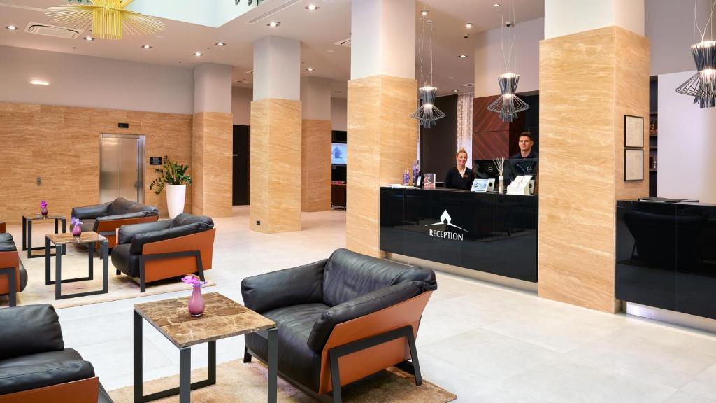 Posedenie v ubytovaní Cornaro Hotel