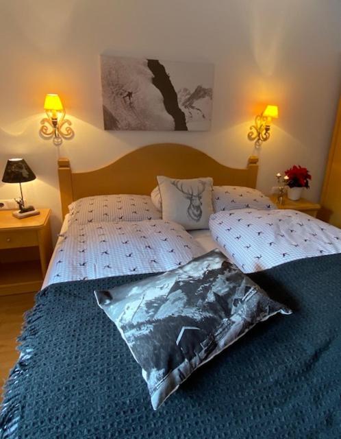Postel nebo postele na pokoji v ubytování Landhaus Alpenland