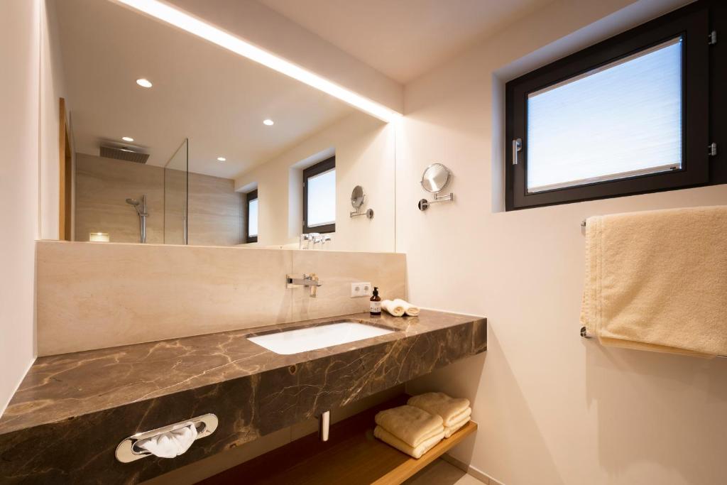 Koupelna v ubytování Hotel Garni Edelweiss