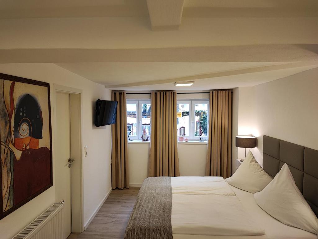 Postel nebo postele na pokoji v ubytování Hotelbetriebe Güldenhaupt GmbH