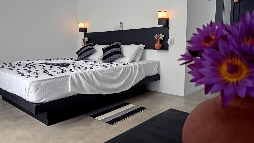 Postel nebo postele na pokoji v ubytování Talalla Leisure