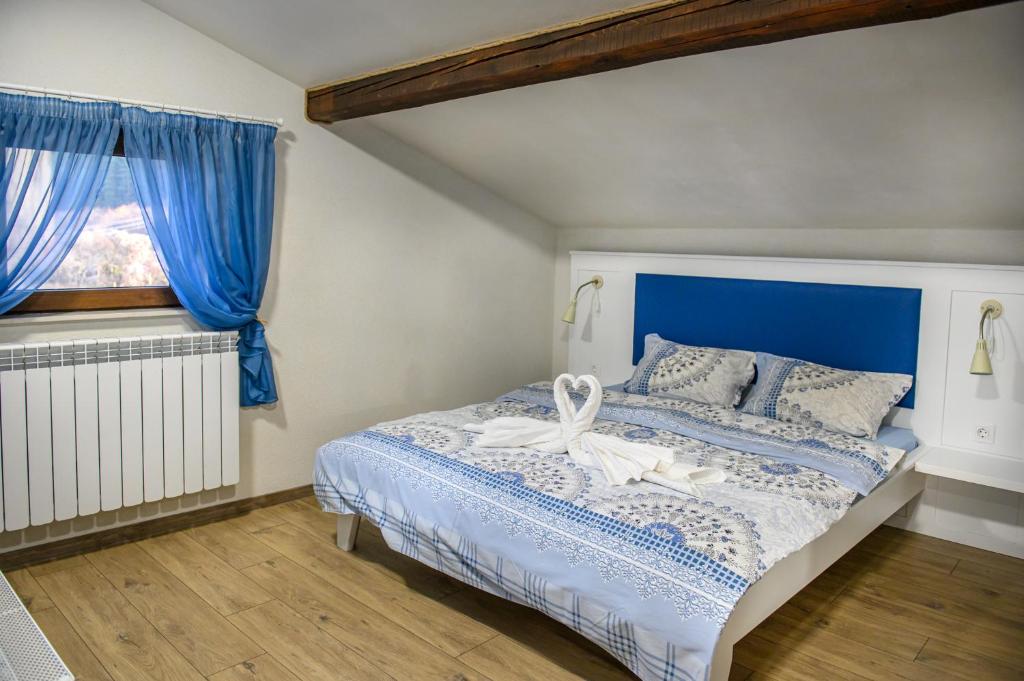Tempat tidur dalam kamar di Villa Murite