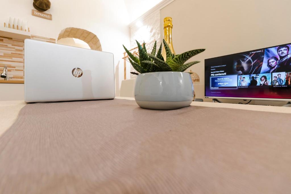 A television and/or entertainment centre at Don Fulippu Home to city center