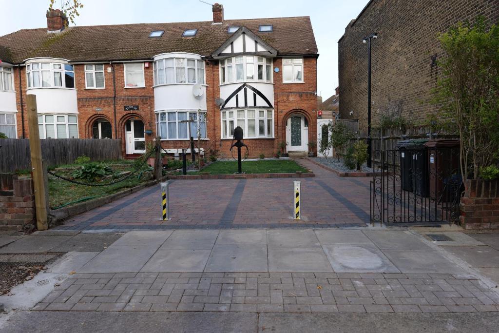 an empty driveway in front of a house at Grenville in London